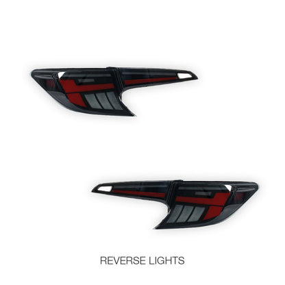 Toyota Corolla E210 Hatch (2019 - 2024) Black Red LED Sequential Tail Lights LH + RH